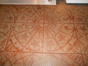 a brown tile floor with a pattern