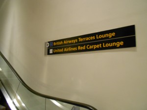 Directly after exiting the security checkpoint, you can take the escalator up one flight to the lounge.