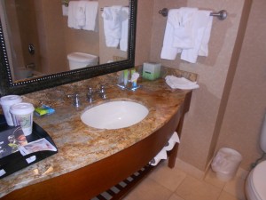 A shot of the bathroom sink vanity area