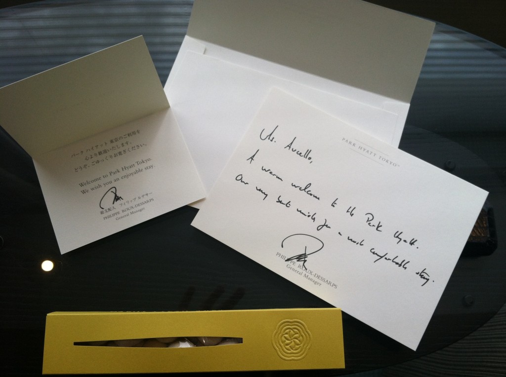 a white envelopes with black writing on it